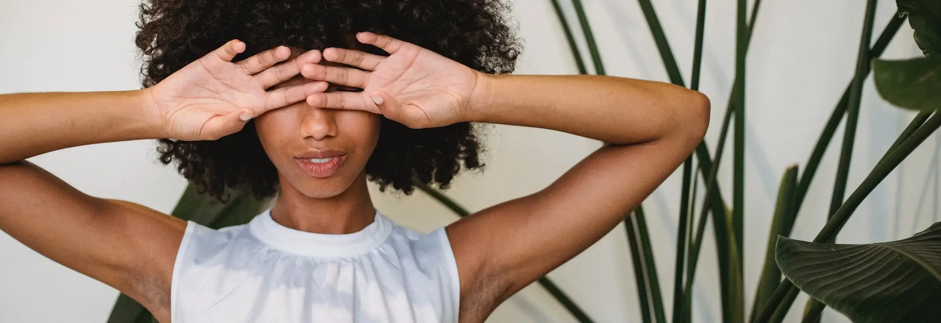 woman covering her eyes